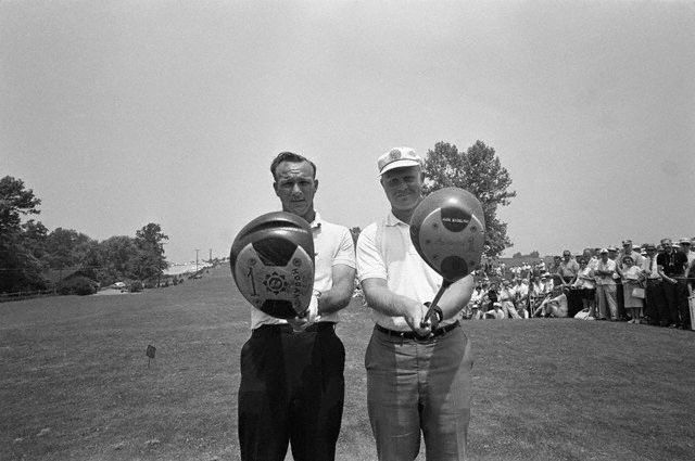 Arnold Palmer and Jack Nicklaus check their driver clubs before teeing off for a tie breaking playoff  in the 1962 US Open-- Oakmont Country Club, Pennsylvania.