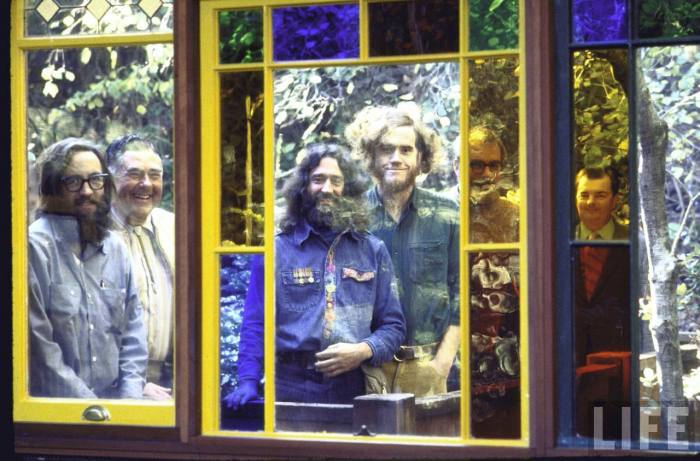 (L-R) contractor Don Umphrees, building inspector Henry Anderson, Kirsch, Holmes, civil engineer Edward Beattie and mechanical engineer Robert Ritter standingin stained glass doorway.