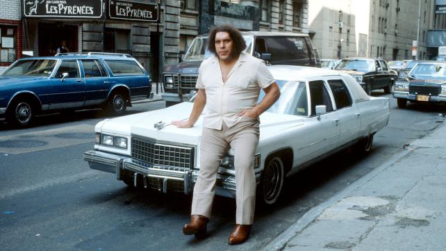 andre the giant sitting on car