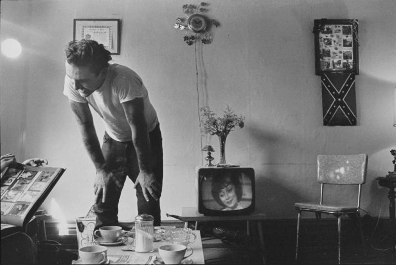 "Corky at home" from The Bikeriders by Danny Lyon  --circa 1965-66.