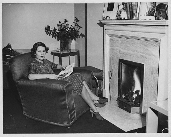 Kay Petre, the racing legend, recovers at her London home after an accident at Brooklands, ca. 1938.