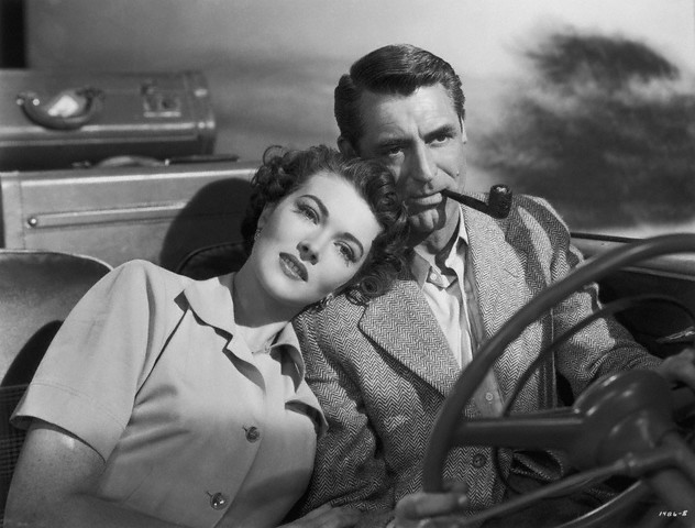 Cary Grant in 1950's film "Crisis"-- smoking and driving is legal, but imagine how many accidents have been caused over the years by folks fumbling for cigarettes, lighters, etc. 