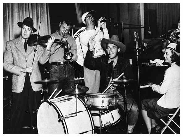 Jack Benny, Dick Powell, Ken Murray, Bing Crosby on drums, Shirley Ross.