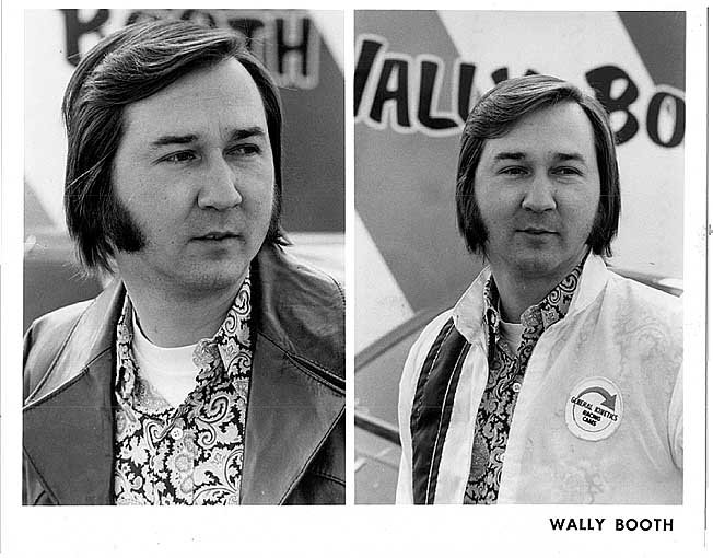 Wally booth, ca. 1970s.  That hair is outta sight, man.  Great style all around -- love the paisley printed shirt.