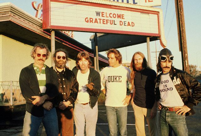 The Grateful Dead-- Bill Kreutzman, Jerry Garcia, Mickey Hart ("God is Sound" T-shirt), Phil Lesh, Bob Weir, and Brent Mydland.